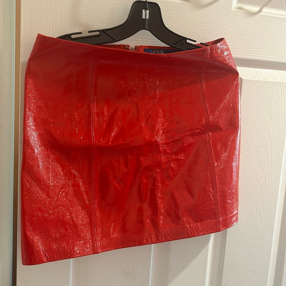 Short pleather red shiny Womens polo skirt.